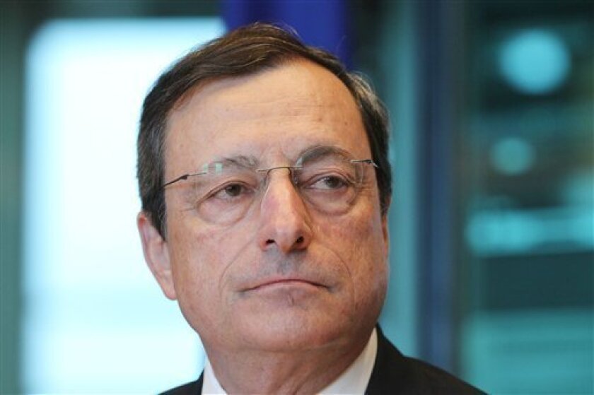 President of the European Central Bank Mario Draghi attends the Committee on Economic and Monetary Affairs at the European Parliament in Brussels, Monday, July 9, 2012. (AP Photo/Yves Logghe)
