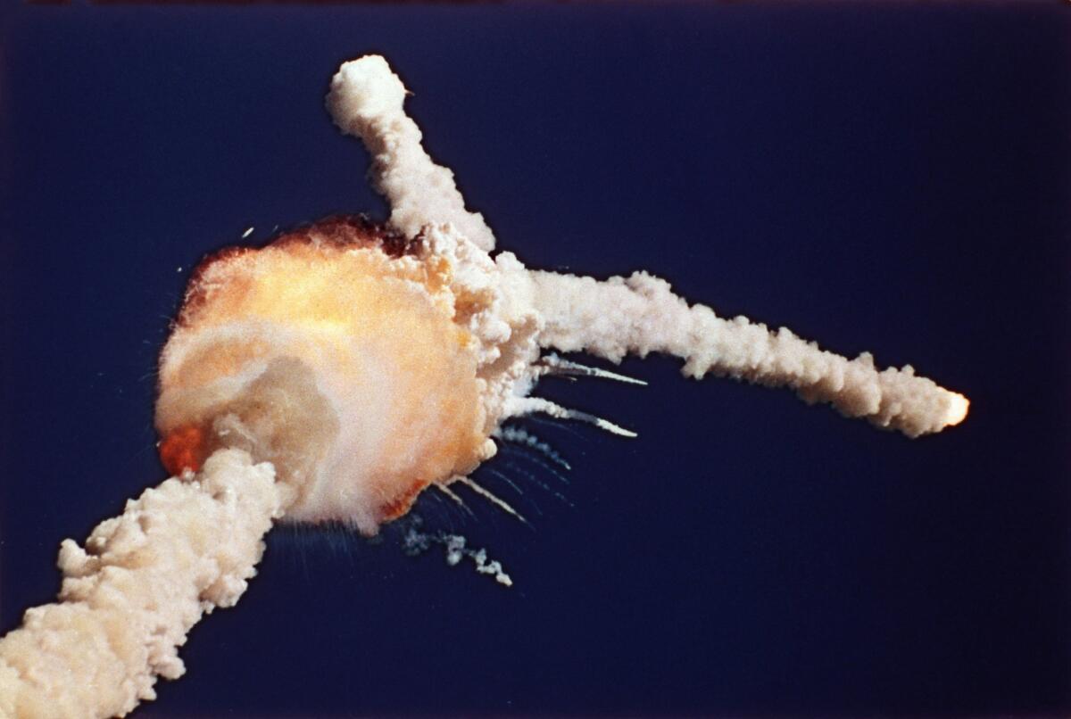 The shuttle Challenger explodes shortly after lifting off from the Kennedy Space Center in Cape Canaveral, Fla.