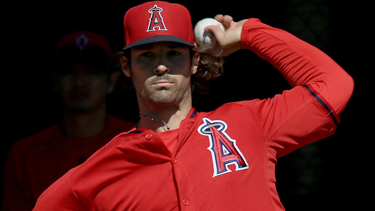 C.J. Wilson throws during a spring training workout session in Tempe, Ariz., on March 4.