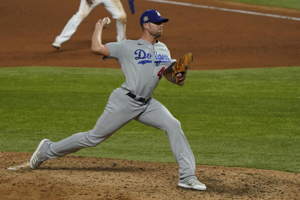 Dodgers relief pitcher Blake Treinen throws against the Tampa Bay Rays during the ninth inning of Game 5.