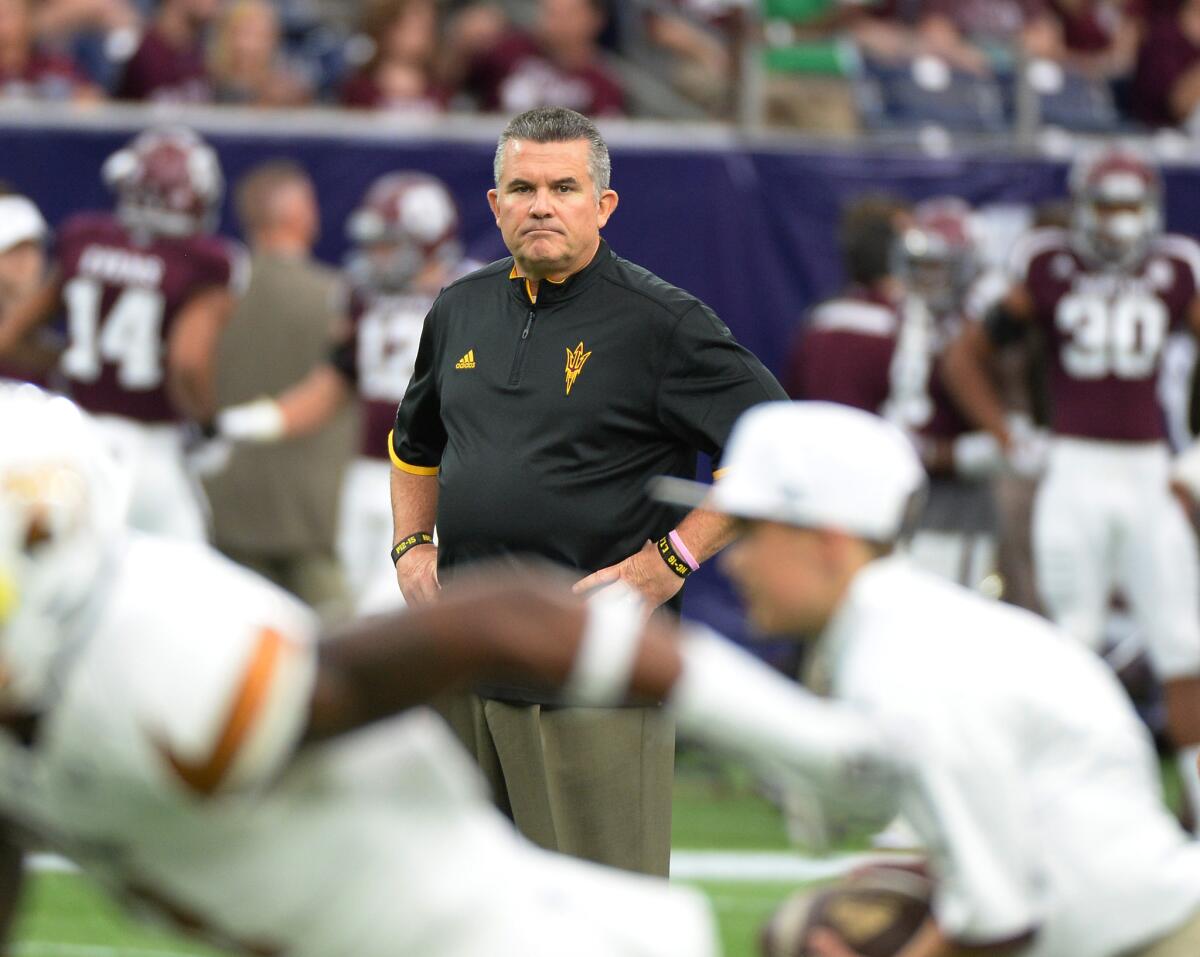 Arizona State Coach Todd Graham watches warm-ups before a game against Texas A&M in Houston on Sept. 5.