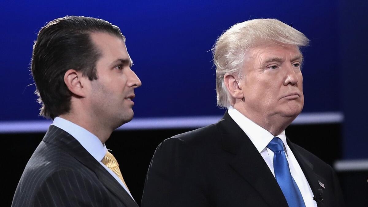 Donald Trump Jr. and President Trump are seen during the 2016 campaign after a Sept. 26 presidential debate in New York.