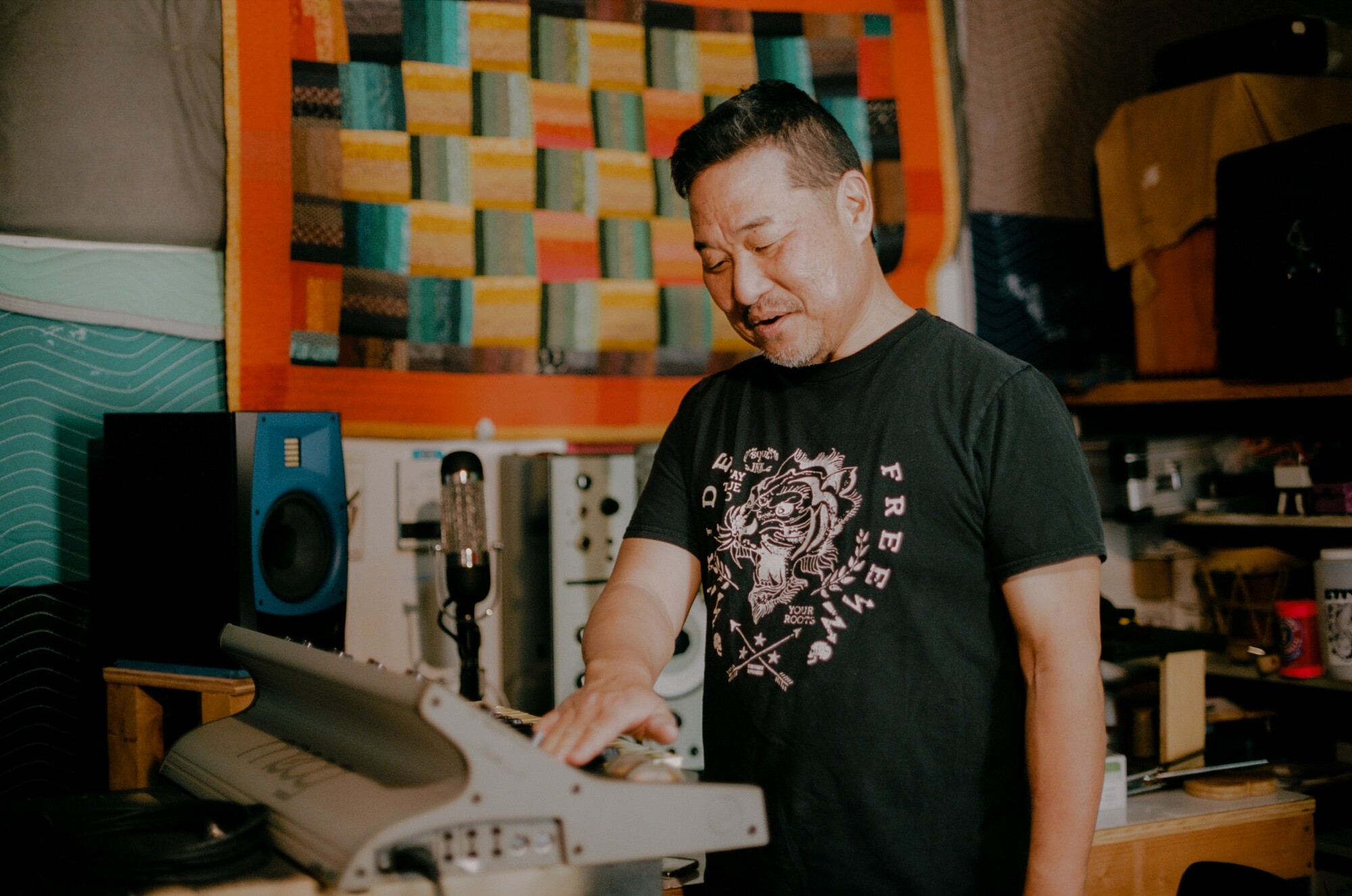 Alan Nakagawa in his home music studio.