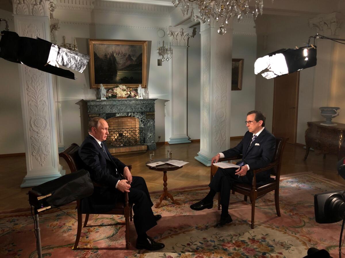 Russian President Vladimir Putin sits for an interview with Chris Wallace