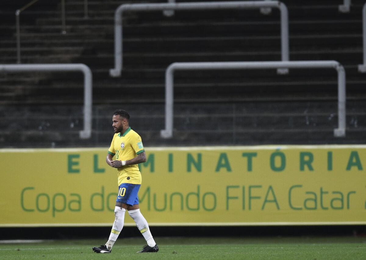 Brazil's Neymar leaves the field at the end of a qualifying soccer match for the FIFA World Cup Qatar 2022 against Bolivia at the Neo Quimica arena in Sao Paulo, Brazil, Friday, Oct. 9, 2020. Brazil won 5-0. (Buda Mendes/Pool via AP)