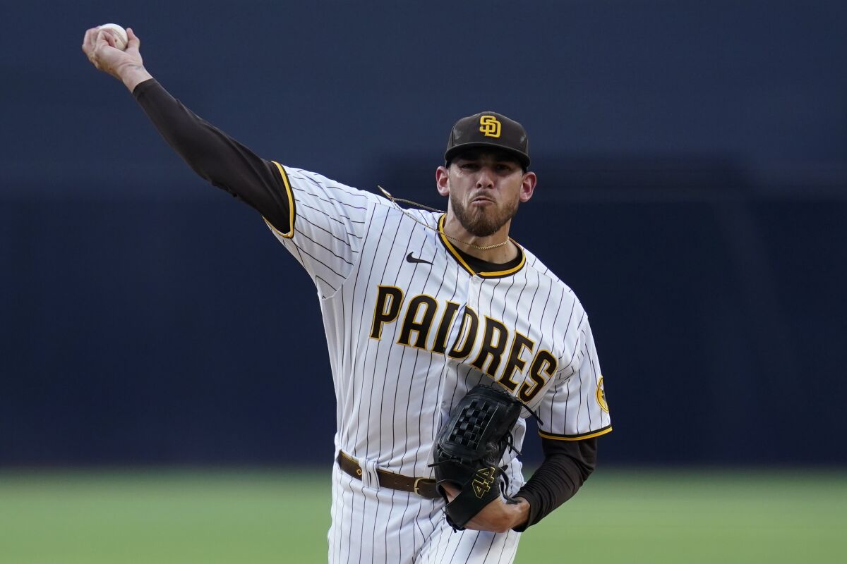 San Diego Padres starting pitcher Joe Musgrove works against a Colorado Rockies batter during the first inning of a baseball game Friday, June 10, 2022, in San Diego. (AP Photo/Gregory Bull)
