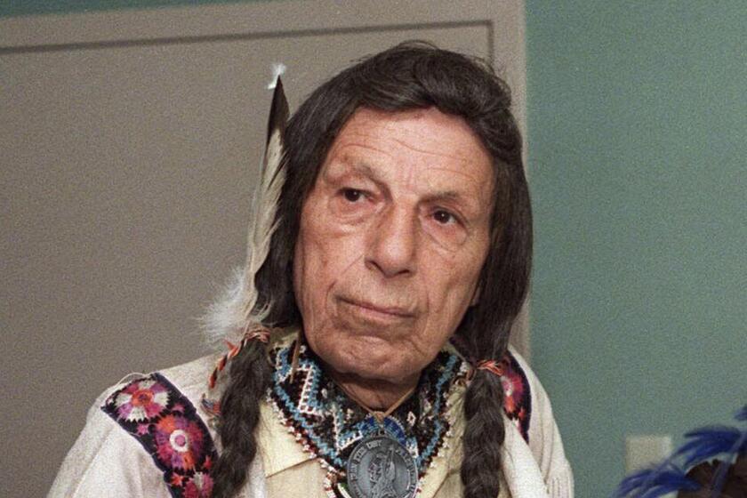 FILE - Iron Eyes Cody, the ''Crying Indian'' whose tearful face in 1970s TV commercials became a powerful symbol of the anti-littering campaign, is pictured in this 1986 photo. Keep America Beautiful, the nonprofit that originally commissioned the advertisement, announced Thursday, Feb. 23, 2023, that ownership of the ad's rights will be transferred to the National Congress of American Indians. (AP Photo/File)
