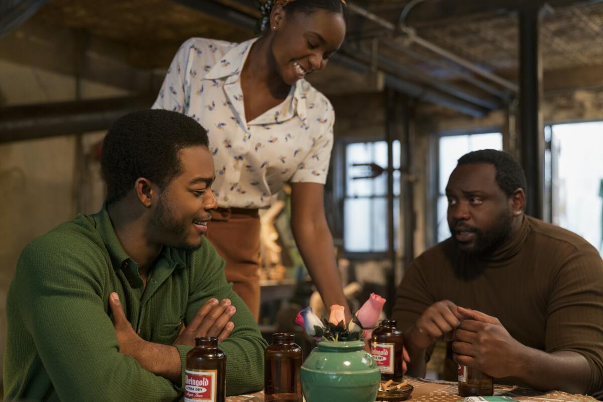 The dinner scene in "If Beale Street Could Talk," from left, Stephan James as Fonny, KiKi Layne as Tish and Brian Tyree Henry as Daniel Carty.