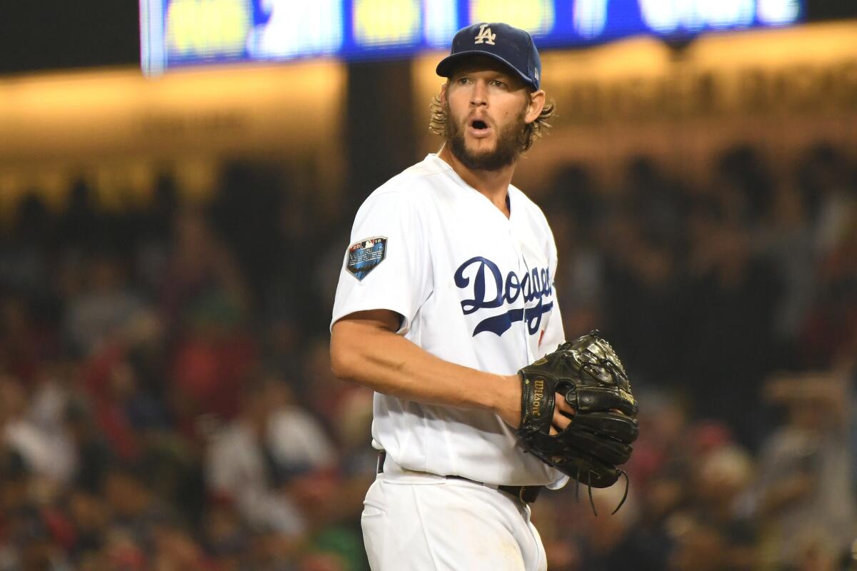 Clayton Kershaw walks off the field.