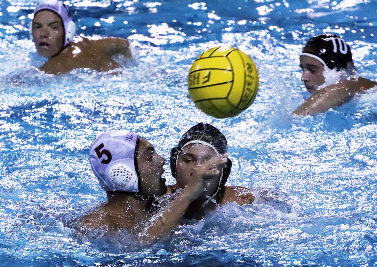 Laguna Beach's Eli Taub (5) passes against Foothill during Wednesday night's match.