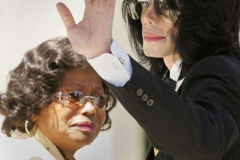 A 2005 photo of Michael Jackson and his mother, Katherine Jackson, outside a courthouse in Santa Maria, Calif.