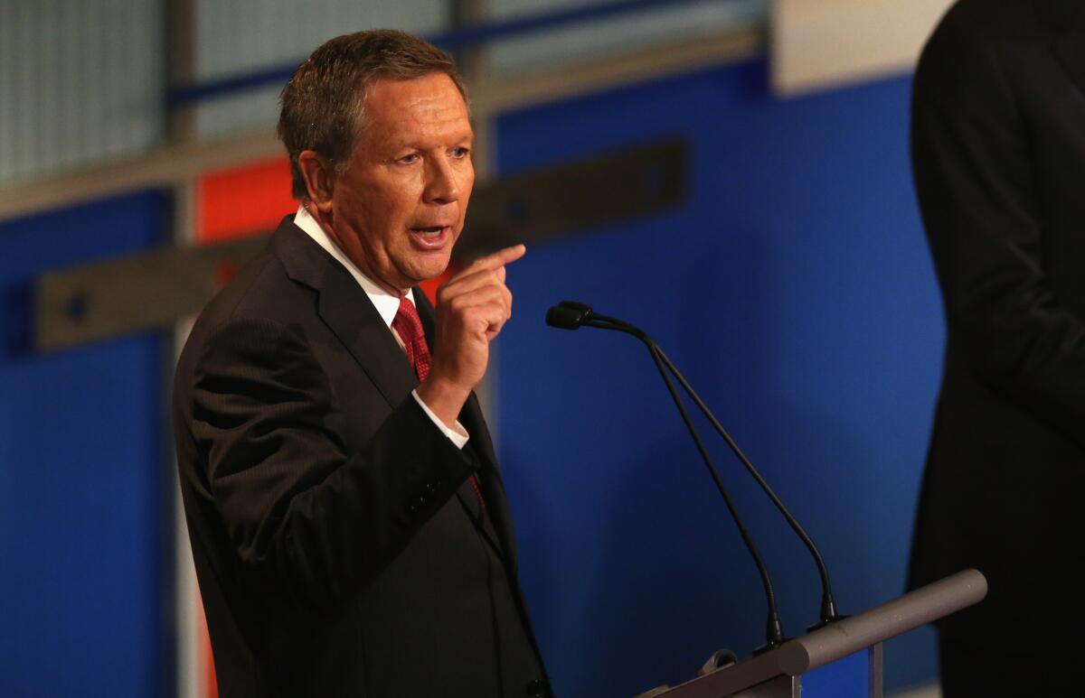 During Tuesday night's Republican presidential debate, Ohio Gov. John Kasich called on the moderators to dig more deeply into the consumption taxes that Sens. Rand Paul and Ted Cruz were advocating.