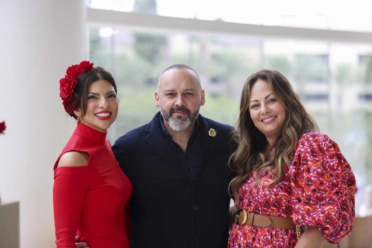 Jassel Kaye, shoe designer and donor George Esquivel and Clara Paye.