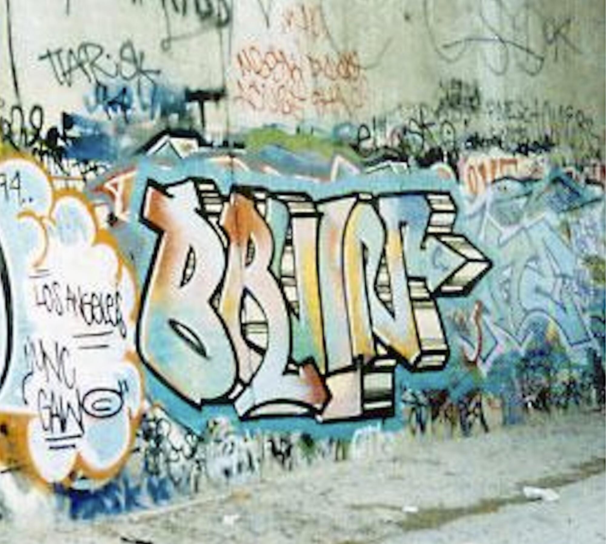 A graffiti piece on a wall.