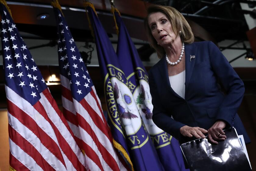 House Minority Leader Nancy Pelosi departs a press conference at the U.S. Capitol Sept. 22, 2016.