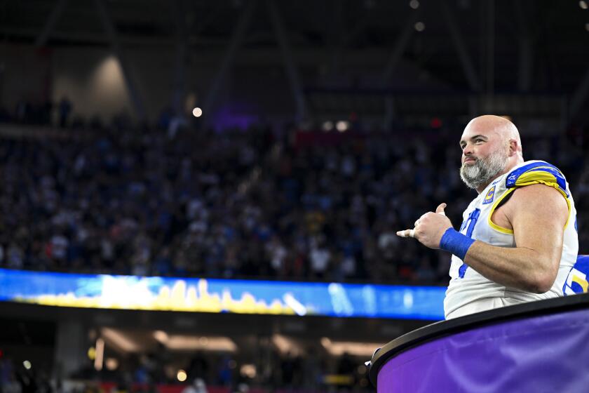 Inglewood, CA - February 13: Los Angeles Rams offensive tackle Andrew Whitworth (77) celebrates after defeating the Cincinnati Bengals 23-20 in Super Bowl LVI at SoFi Stadium on Sunday, Feb. 13, 2022 in Inglewood, CA.(Wally Skalij / Los Angeles Times)