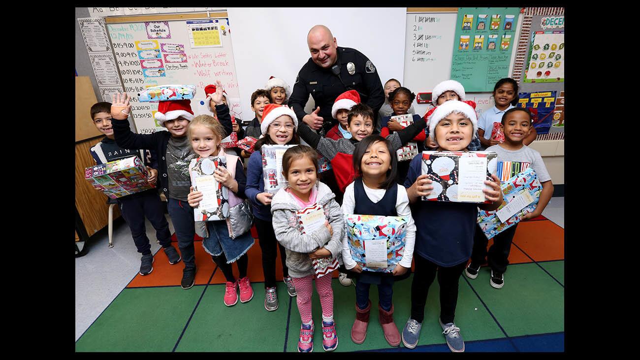 Photo Gallery: Cerritos Elementary school students receive gifts from Dignity Health Glendale Memorial Hospital and Health Center