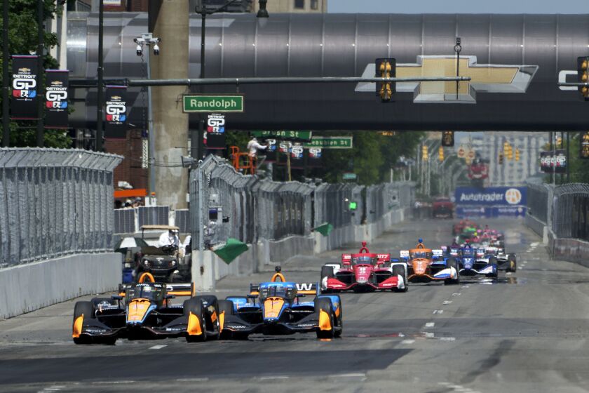 Cars practice for the IndyCar Detroit Grand Prix auto race in Detroit, Friday, June 2, 2023. (AP Photo/Paul Sancya)
