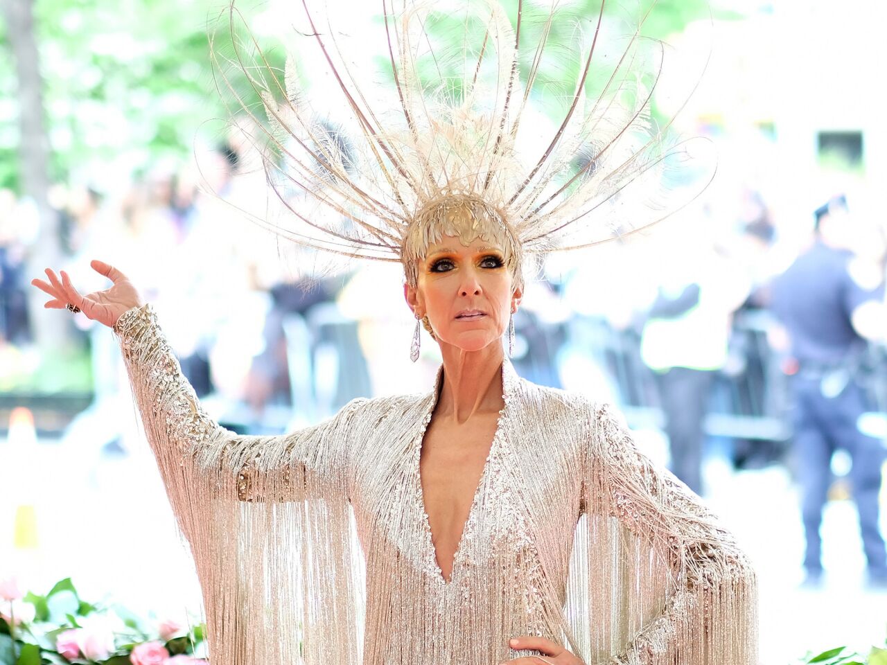 Celine Dion created visual drama with her headpiece and smoky eyes.