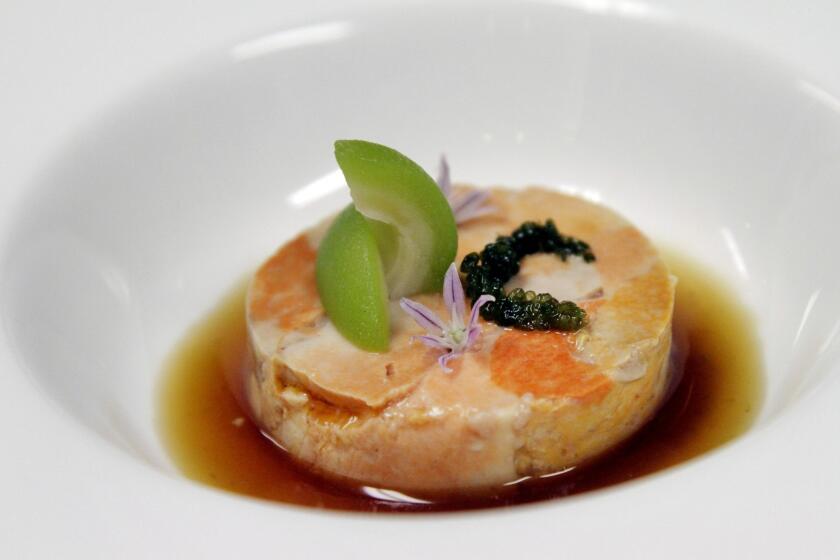 Ankimo (monkfish liver) is combined with umeboshi ponzu, sea grapes and momokochan.