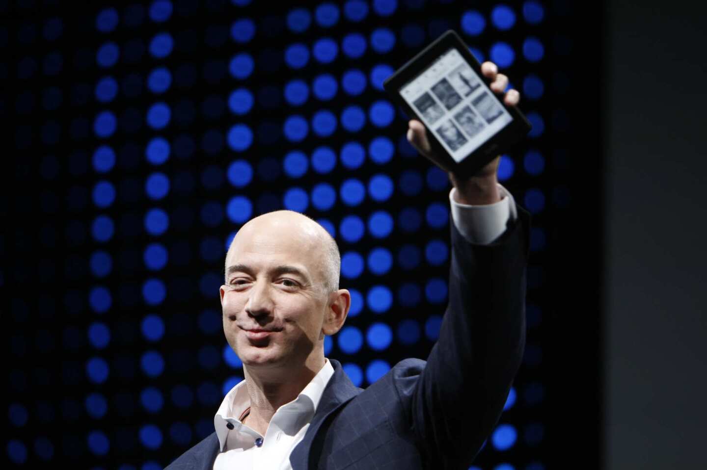 Amazon Chief Executive Jeff Bezos unveils the new Kindle Paperwhite on Thursday.
