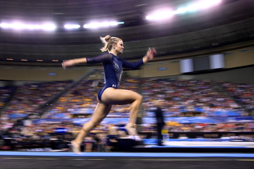 Gracie Kramer sprints towards the vault in the NCAA Gymnastics Championship at the Ft. Worth Connvention Center Saturday.