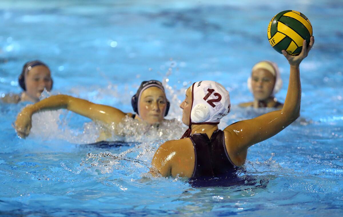 Laguna Beach’s Molly Renner winds up a shot against Newport Harbor in the semifinals of the CIF Southern Section Division 1 playoffs on Feb. 19.