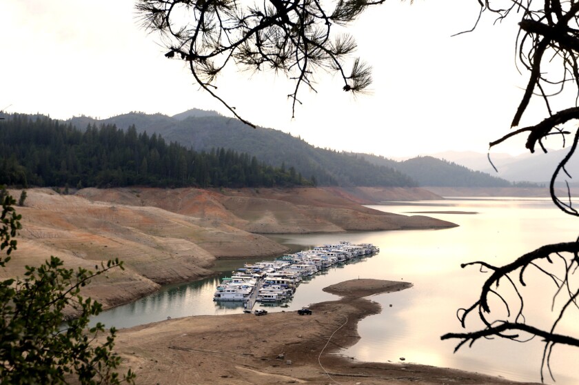 House boats are docked in the low water at Lake Shasta's Bay Bridge resort near Redding, Calif. Gov. Jerry Brown and lawmakers are Brown and lawmakers are hoping California's drought will persuades voters to approve Proposition 1.