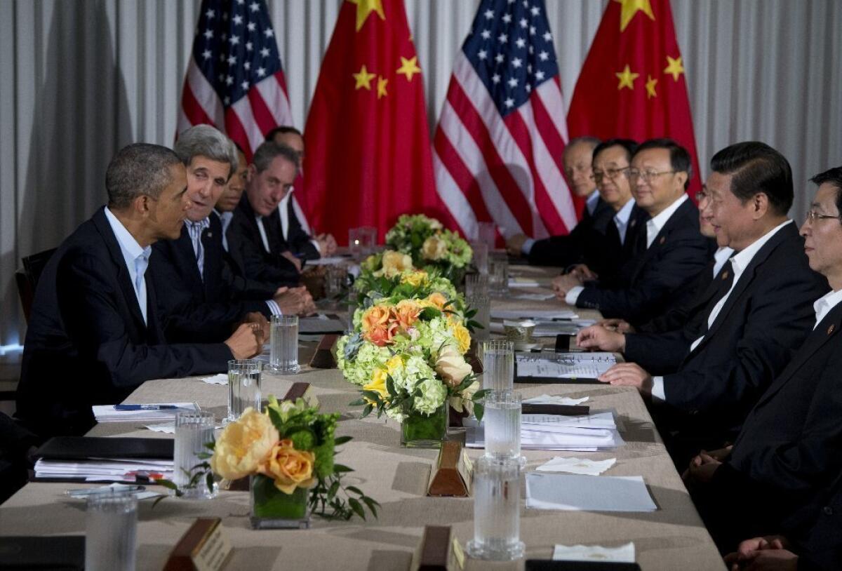 President Obama and Chinese President Xi Jinping are seen meeting on June 8 in Rancho Mirage.