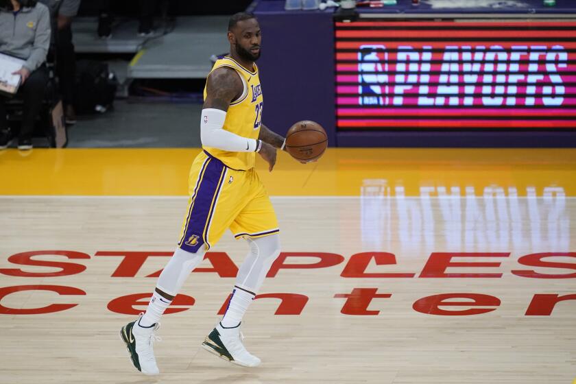 The Lakers' LeBron James controls the ball during Game 6 of a first-round playoff series June 3, 2021.