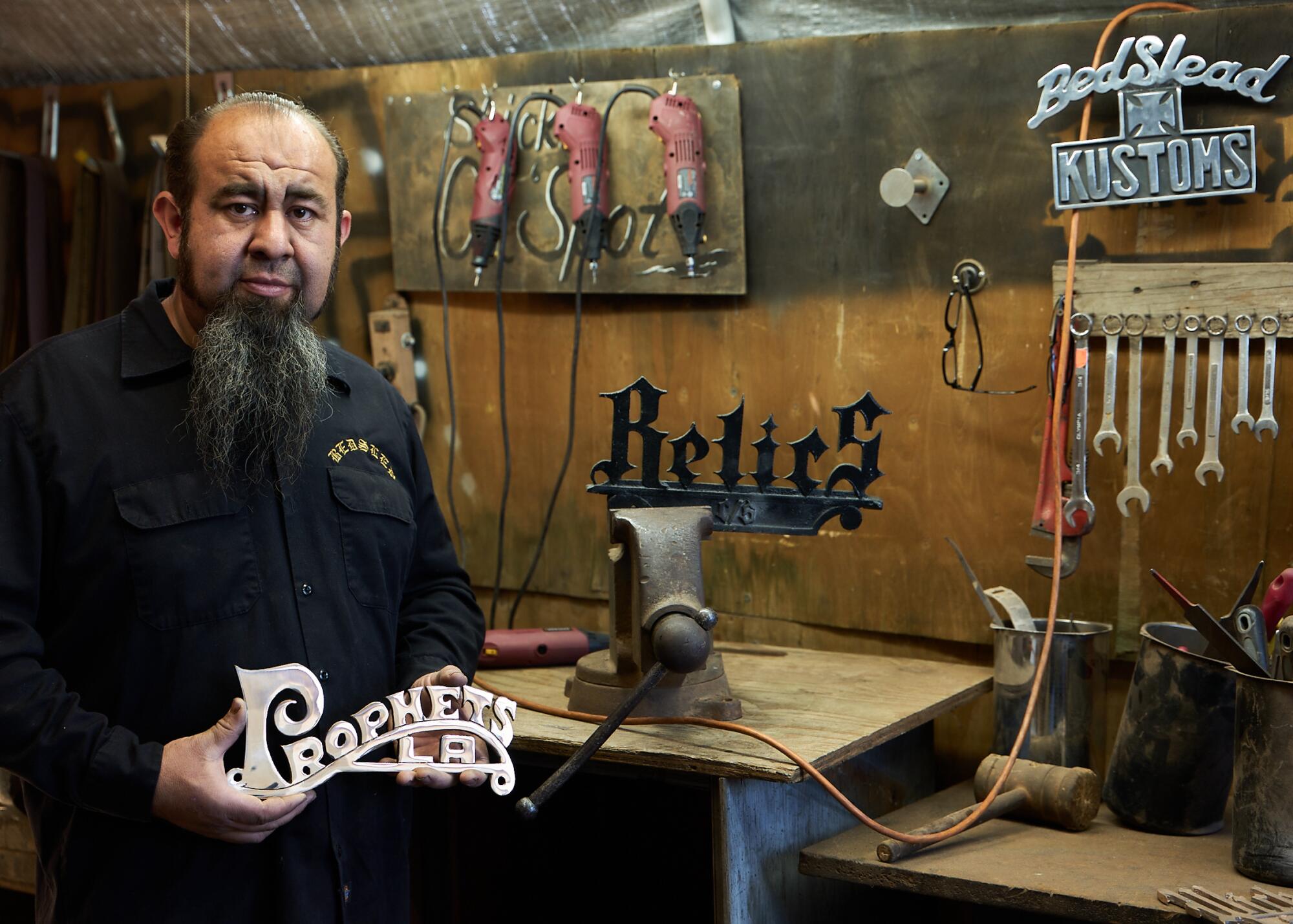 The finishing of the lowrider plaque designed by Pinche Kid. David Lopez will be finishing up the design.