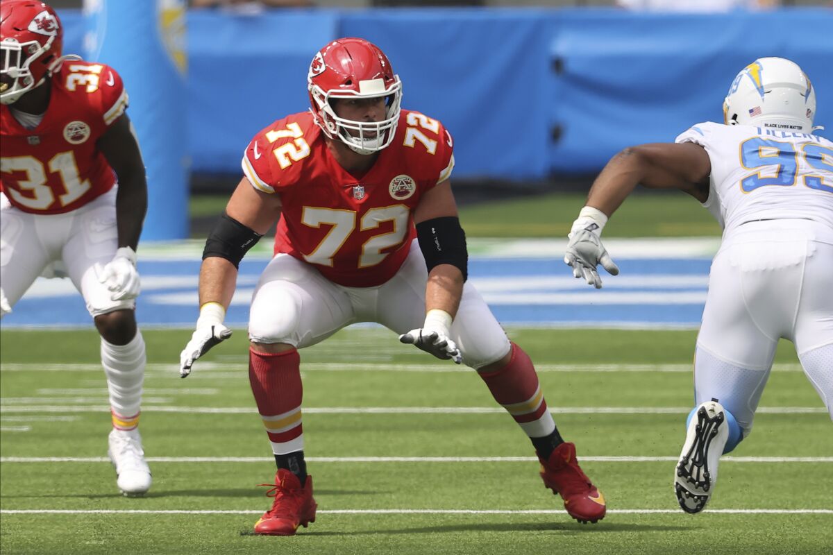 FILE - Kansas City Chiefs offensive tackle Eric Fisher (72) gets ready to block during an NFL football game between the between the Chiefs and Los Angeles Chargers in Inglewood, Calif., in this Sunday, Sept. 20, 2020, file photo. Two people with direct knowledge have confirmed to The Associated Press the Indianapolis Colts have signed Eric Fisher to play left tackle. Kansas City selected Fisher with the No. 1 overall pick in the 2013 draft but the Chiefs released their longtime starter in March. (AP Photo/Peter Joneleit, File)