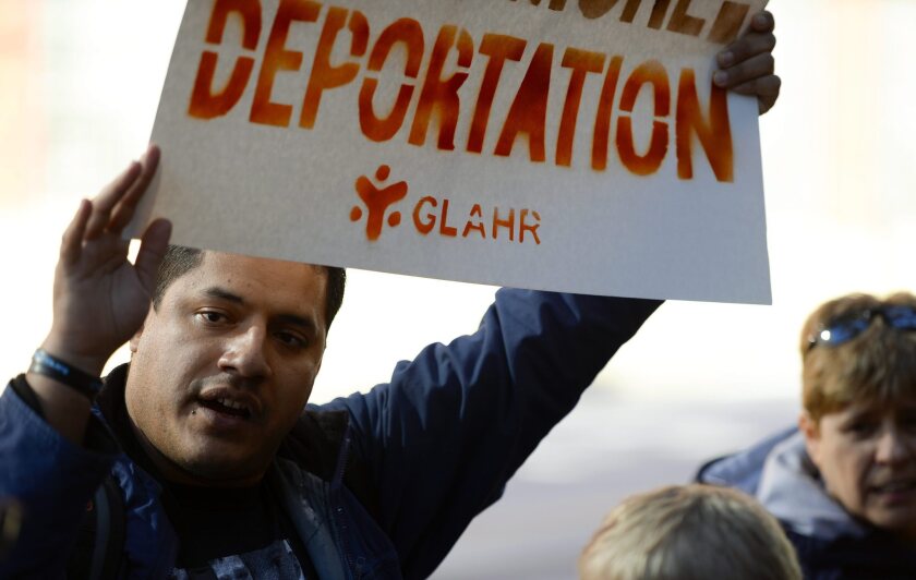 Deportations have generated protests around the country. Orange County probation officials will review a policy of referring juvenile immigrants who are believed to be in the country illegally to federal immigration authorities.