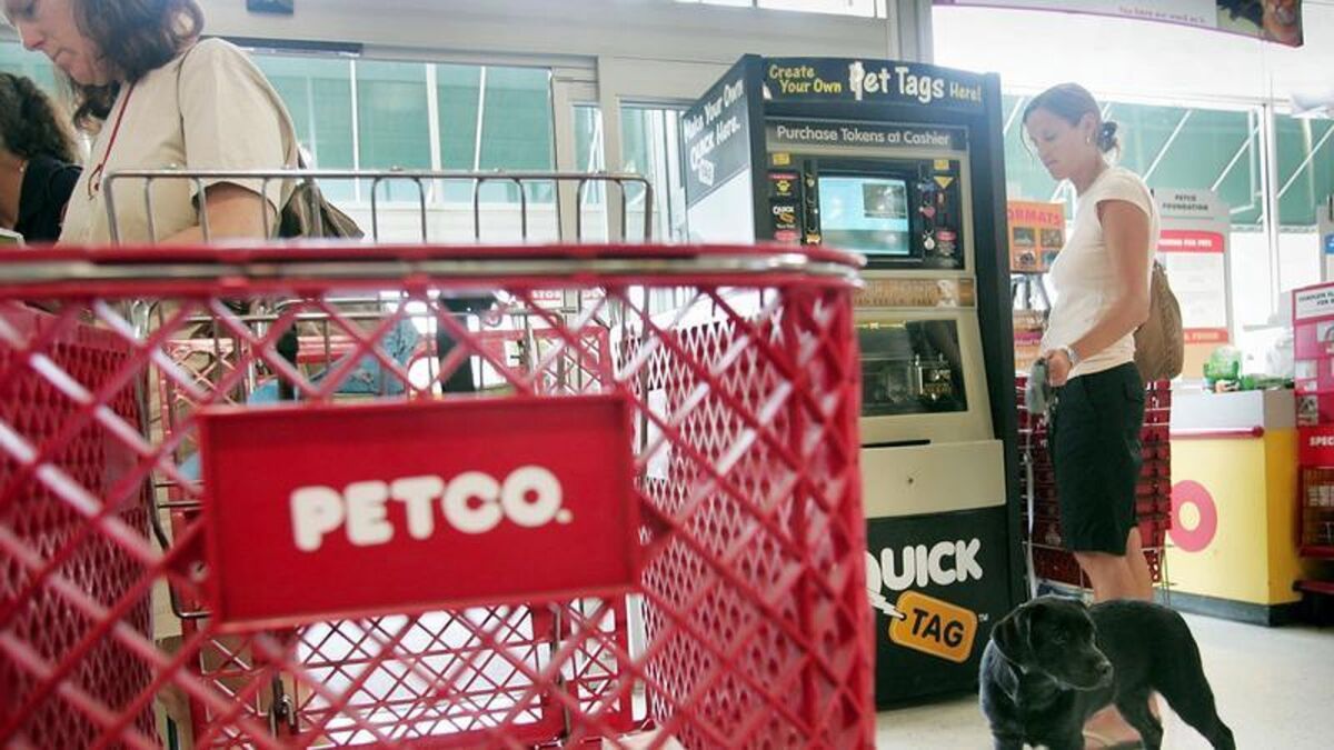 Shoppers look over the merchandise at a Petco store in Chicago.
