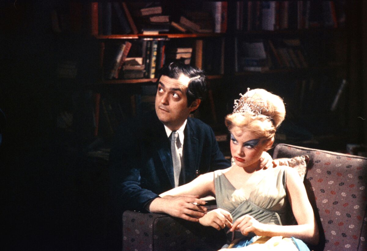 Stanley Kubrick and Sue Lyon on the set of the movie "Lolita."