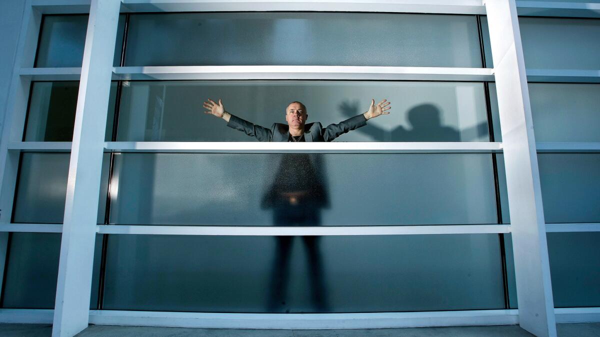 Damien Hirst at the entrance to Gagosian Gallery in Beverly Hills in 2011.