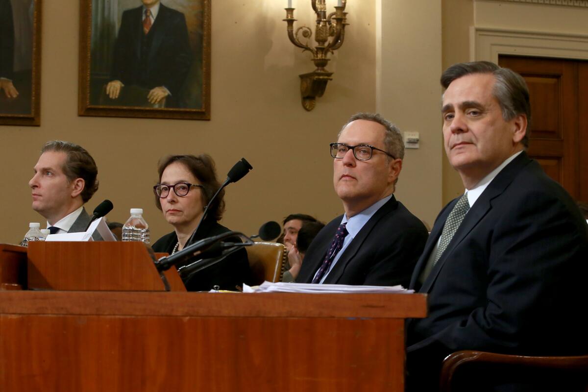 The four law professors called to testify in the President Trump impeachment hearing listen before the House Judiciary Committee on Dec. 4.