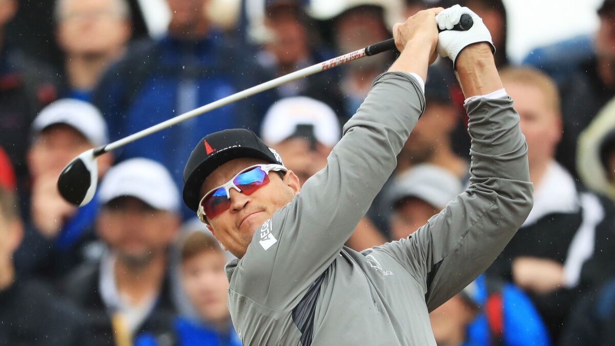 After two rounds, Zach Johnson, at six under, is tied with fellow U.S. golfer Kevin Kisner for the lead at the British Open.