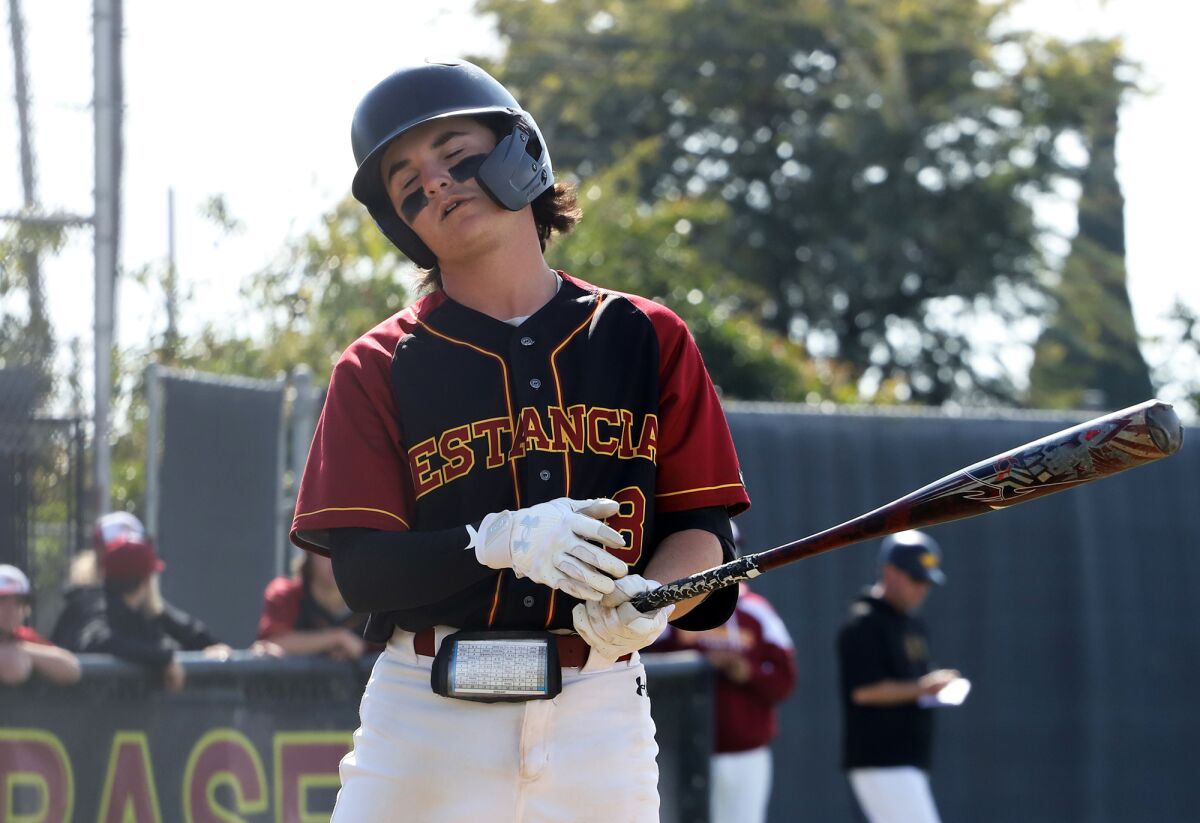 Estancia's Miles Moyer (8) reacts after popping out against Calvary Chapel on Friday.