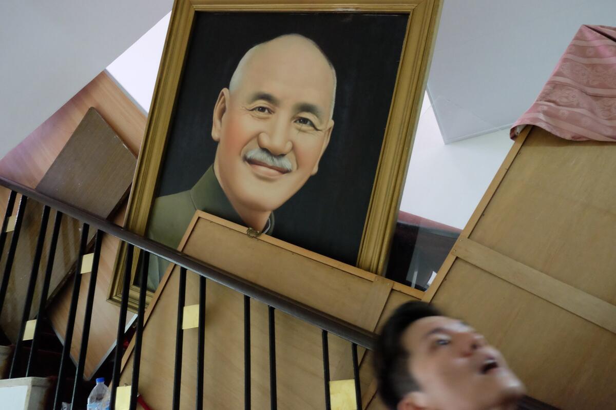 A portrait of the late Taiwan president Chiang Kai-shek hangs inside parliament in Taipei.