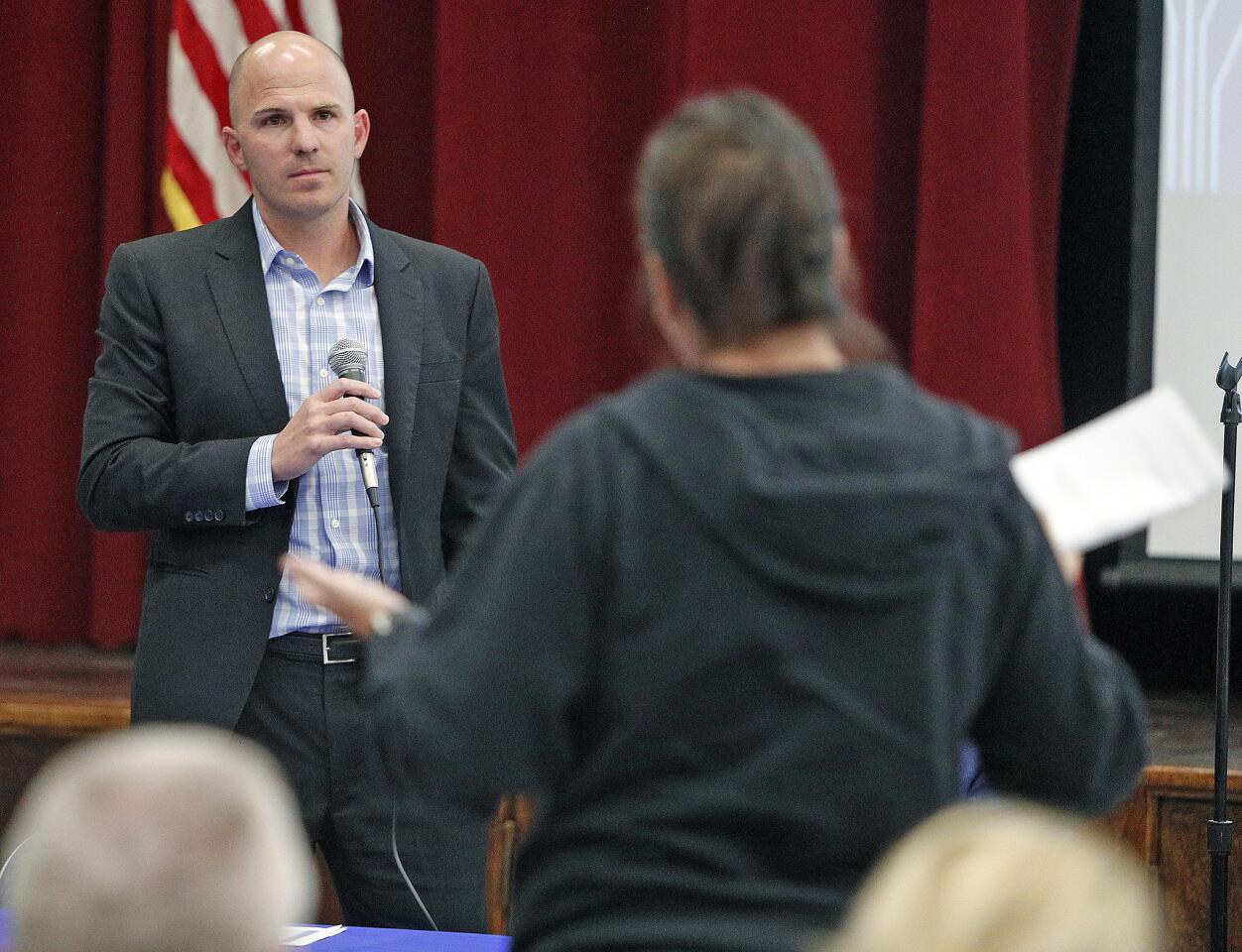 Burbank Unified School District Superintendent Matt Hill listens to comments from parent K.C. Johnson, of Burbank with two children currently at Walt Disney Elementary School, who is speaking about her displeasure for the changes to the plans at a town hall discussion with him about school renovations on Tuesday, November 13, 2018. Parents in attendance were mostly in agreement more space is needed, and comments ranged from complete displeasure with the process to brainstorming for solutions to the lack of space.