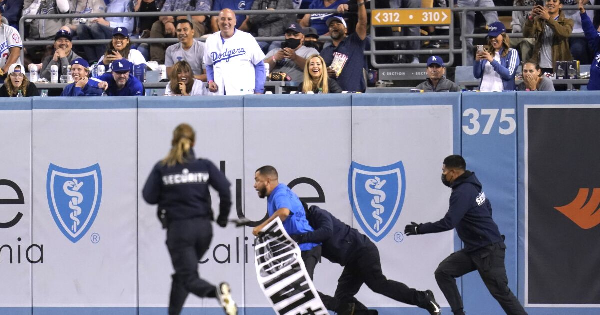 Dodger Stadium protesters remind L.A. of displaced Latinos - Los ...