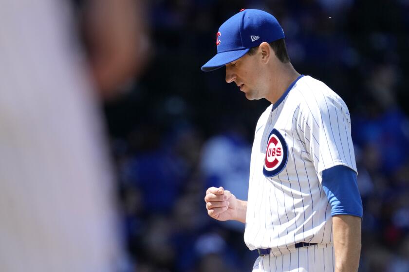 Chicago Cubs starting pitcher Kyle Hendricks looks down during the fourth inning of a baseball game against the Miami Marlins in Chicago, Sunday, April 21, 2024. (AP Photo/Nam Y. Huh)