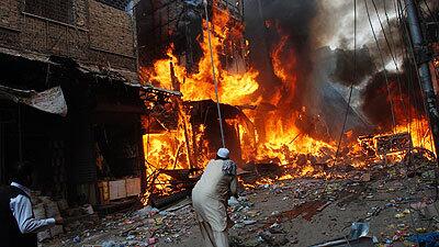 The scene in Peshawar, Pakistan, where a car bomb tore through a marketplace.