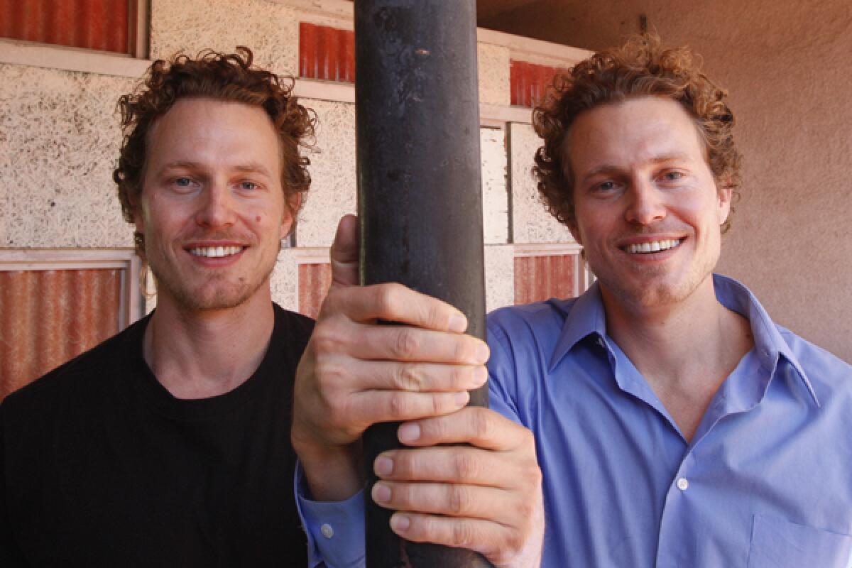 Twin brothers Logan and Noah Miller, at right, wrote, produced, directed and starred in their first feature film, "Touching Home."