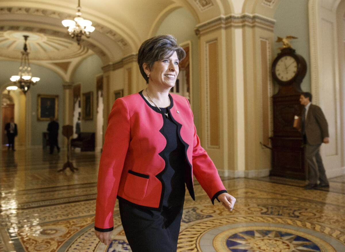 Sen. Joni Ernst (R-Iowa) is pictured outside the Senate chamber at the U.S. Capitol in Washington.
