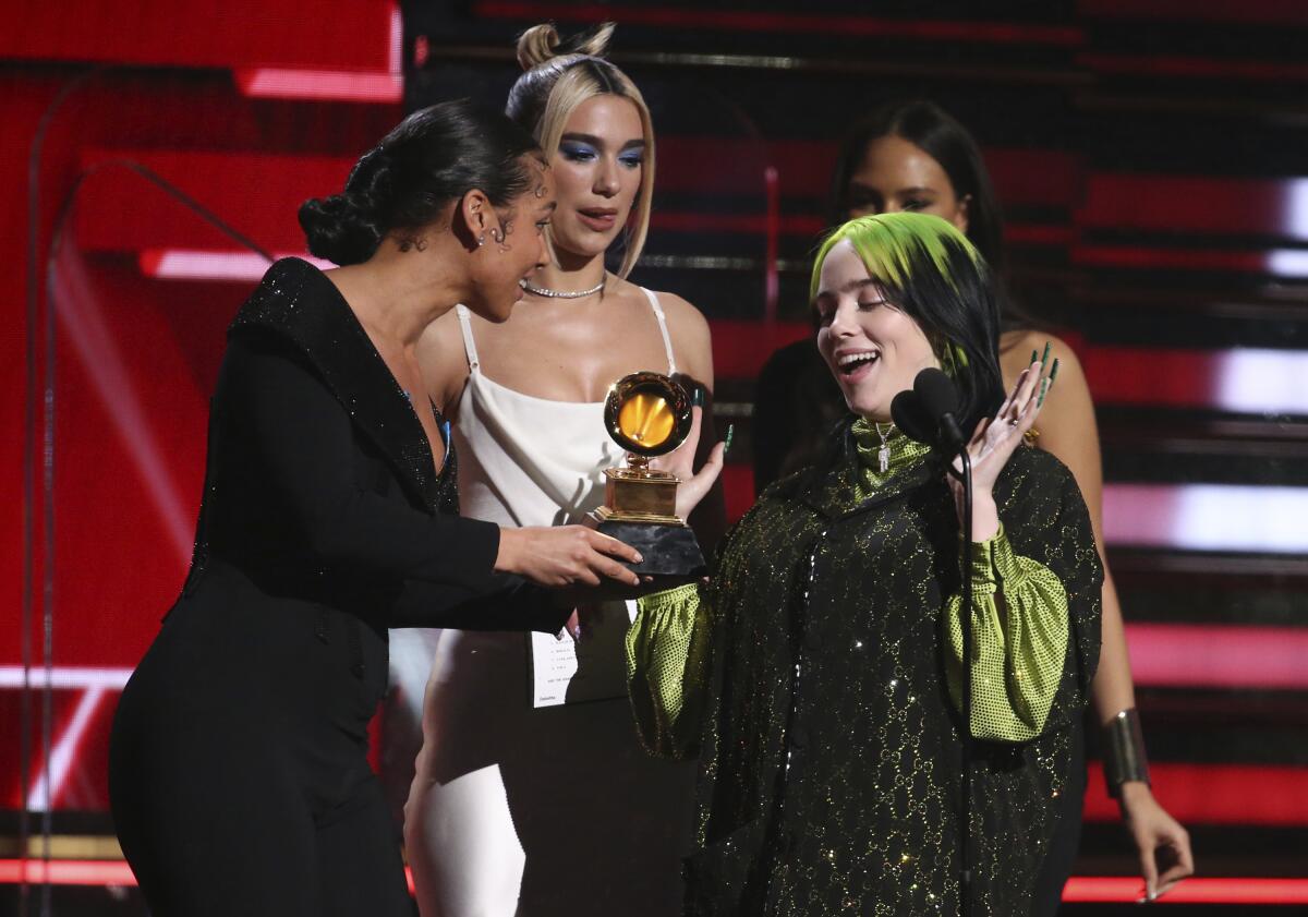 Alicia Keys, left, Dua Lipa and Billie Eilish, 62nd annual Grammy Awards, Jan. 26, 2020