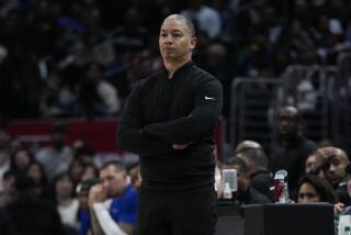 Los Angeles Clippers head coach Tyronn Lue watches the second half of an NBA basketball game.