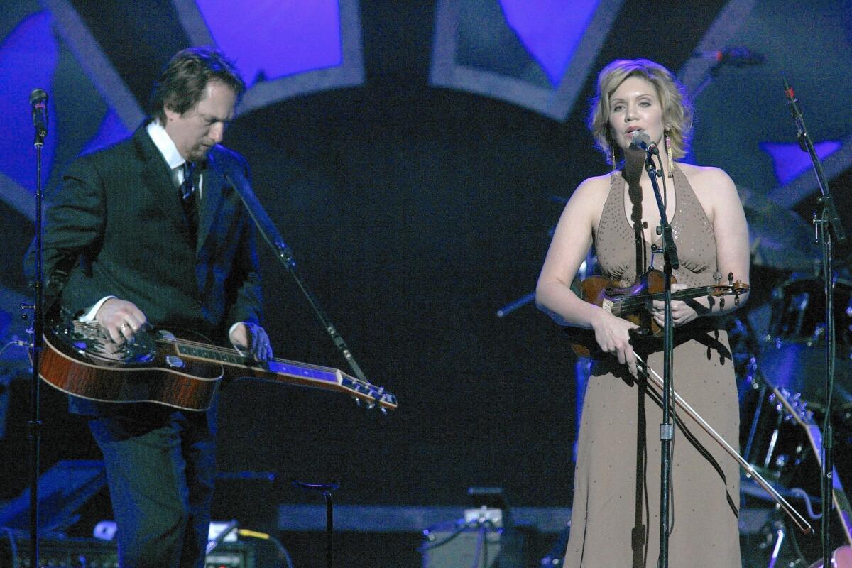Jerry Douglas performing with Alison Krauss in 2006. They return to the OC Fair on Sunday.