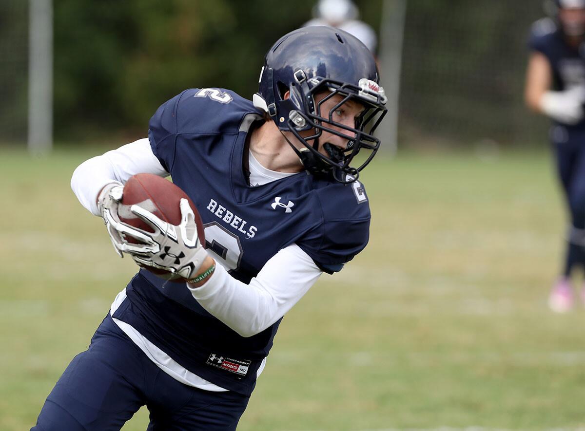 Flintridge Prep quarterback Max Gitlin completed 32 of 51 passes for 375 yards and four touchdowns against Windward.